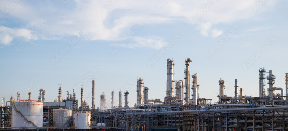 Fototapeta premium Oil and Gas Industrial zone,The equipment of oil refining,Close-up of industrial pipelines of an oil-refinery plant,Detail of oil pipeline with valves in large oil refinery.