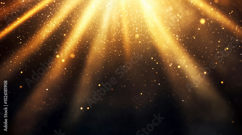 Golden rays of light illuminating sparkling particles