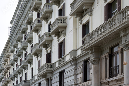 Building facade in the Umbertino district of the city of Bari in Italy photo