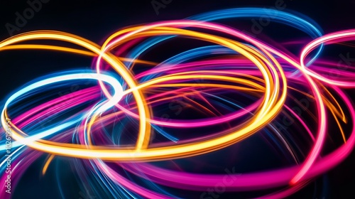 Abstract neon light trails swirling in a dark background.