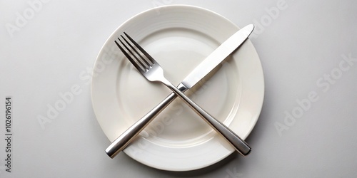 Knife and fork on a plate