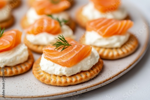 Delicious puff pastry topped with creamy cheese, dill, and fresh smoked salmon, garnished with dill sprigs.