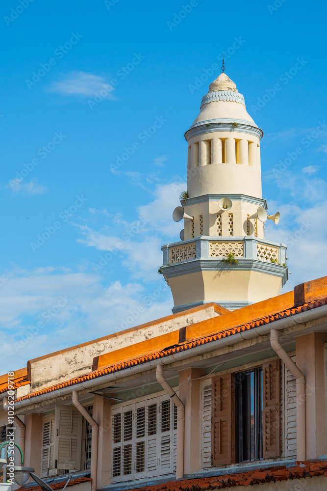 Fototapeta premium A Street view or street scene, road, view of cityscape in Georgetown, Penang on 3 July 2024, unesco world heritage site, travel destinations. Life at night time, love rain road, light and traffic.