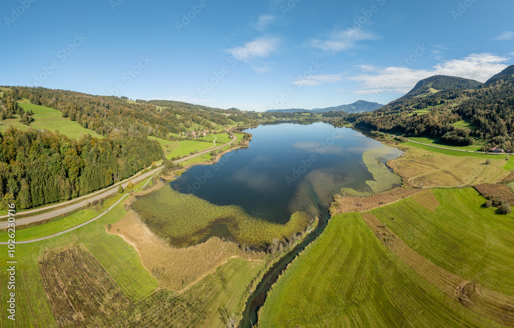 Aerial landscape in the Allgaeu Alps with lake Alpsee next to Immenstadt, Bavaria, Germany Aerial landscape in the Allgaeu Alps with lake Alpsee next to Immenstadt, Bavaria, Germany