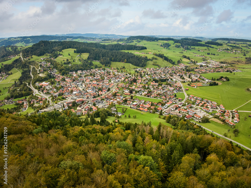 Obraz premium Aerial photo of the village of Oberstaufen in the Allgaeu Alps, Bavaria, Germany