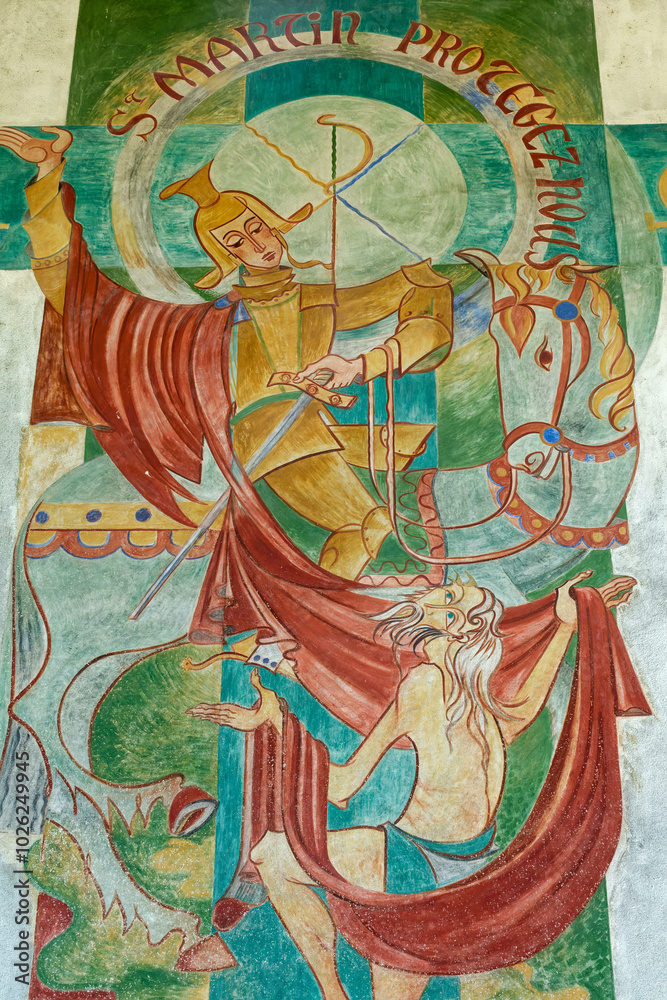 2024-07-28, Saint Martin sur la Chambre, FRANCE. Fresco of Saint Martin of Tours cuting a piece of his cloak for a beggar. Saint of the Roman Catholic Church. 2024-07-28, Saint Martin sur la Chambre, FRANCE. Fresco of Saint Martin of Tours cuting a piece of his cloak for a beggar. Saint of the Roman Catholic Church.
