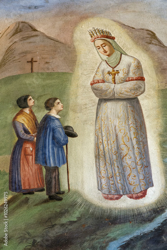 2024-07-28 Sainte Marie de Cuines, FRANCE. Fresco of The apparition of Our Lady of La Salette to the two little shepherds. . photo