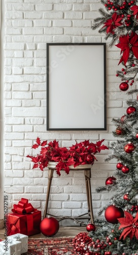 Festive holiday decorations with red ornaments and a blank frame on a brick wall