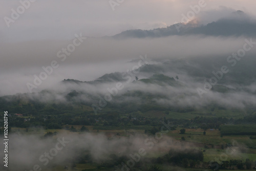 A landscape view of nature of green mountain at sunrise morning