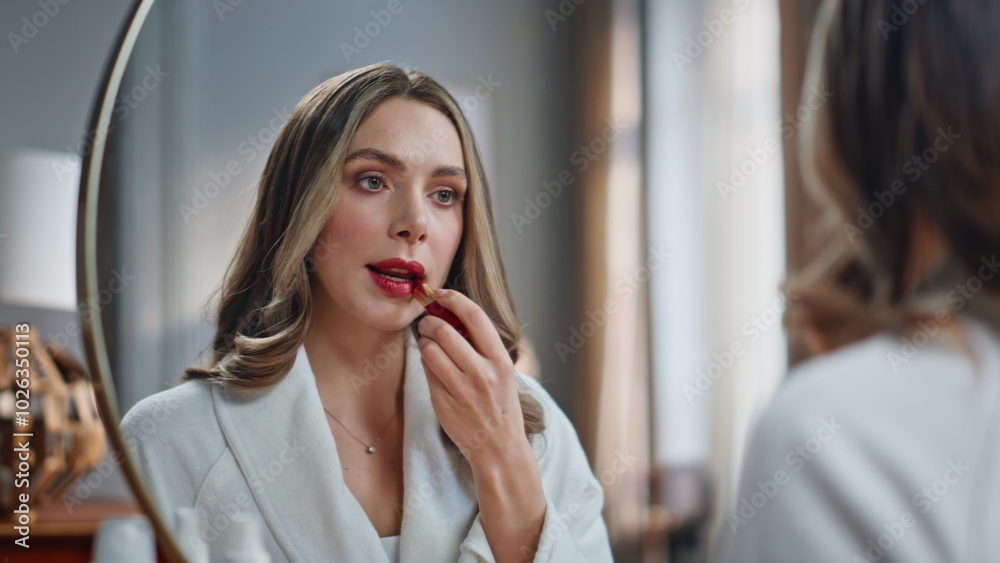 Luxury lady holding lipstick in hands in morning closeup. Woman looking mirror Luxury lady holding lipstick in hands in morning closeup. Woman looking mirror