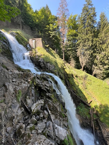 Giessbach Falls in the eponymous nature park and over Lake Brienz - Giessbachfälle (Giessbachfaelle) im gleichnamigen Naturpark und über dem Brienzersee-Canton of Bern, Switzerland (Schweiz) photo