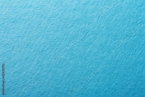 Smooth sky blue color paper background close-up