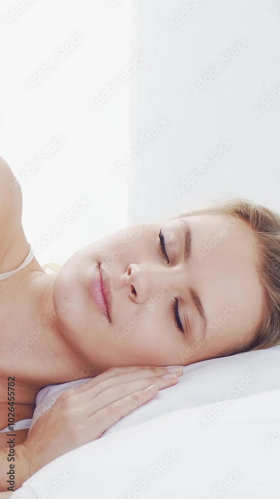 Peaceful, serene scene of a young woman sleeping comfortably in bed, with soft, natural lighting. Perfect for themes of relaxation, rest, and tranquility. Peaceful, serene scene of a young woman sleeping comfortably in bed, with soft, natural lighting. Perfect for themes of relaxation, rest, and tranquility.