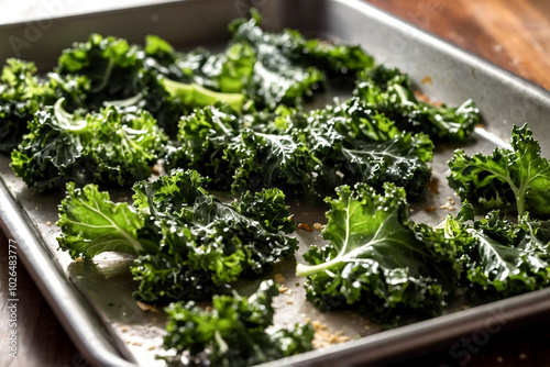 kale leaves on a baking tray for roasting