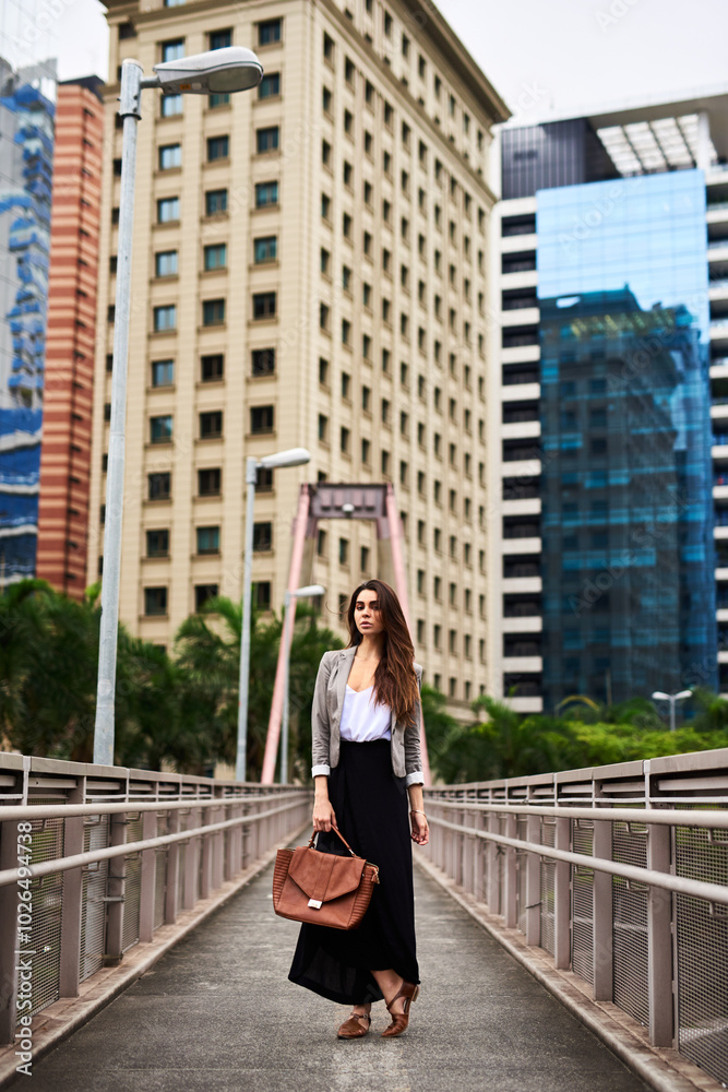 Business woman, portrait and fashion for confidence, pride and style for trendy clothes or outfit. Female person, city background and wardrobe with accessories, handbag and casual aesthetic in Brazil Business woman, portrait and fashion for confidence, pride and style for trendy clothes or outfit. Female person, city background and wardrobe with accessories, handbag and casual aesthetic in Brazil