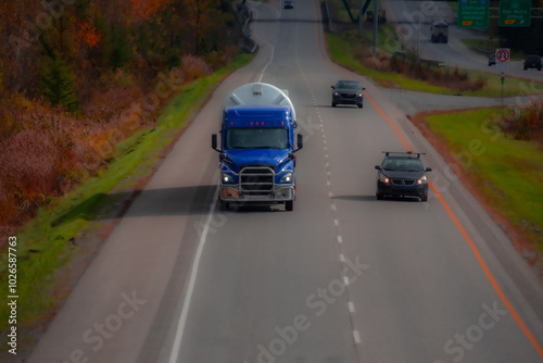 Heavy truck on a Canadian highway in the fall in Quebec