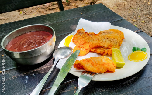 Açaí com peixe frito