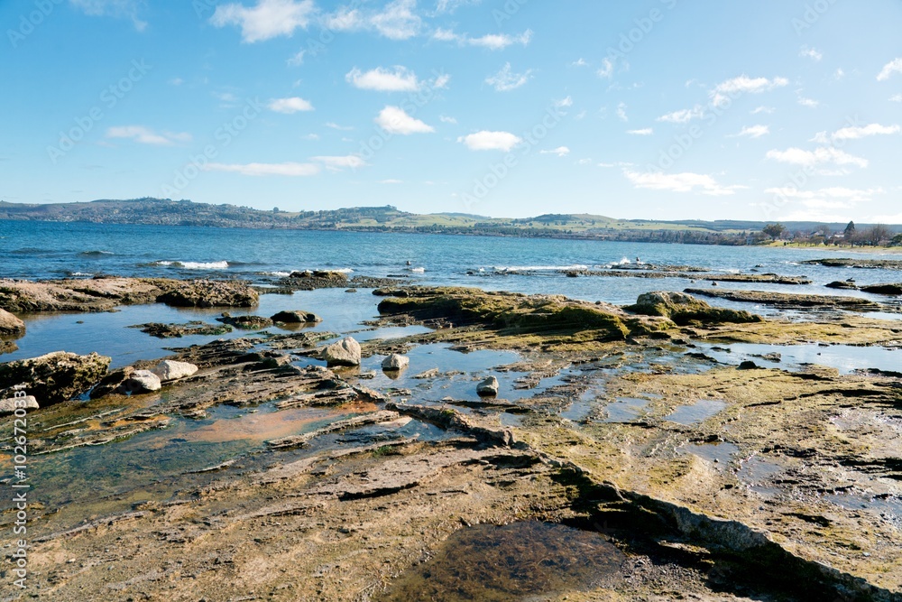 Rocky Shore of Lake Taupo - Stunning Natural Landscape in New Zealand Rocky Shore of Lake Taupo - Stunning Natural Landscape in New Zealand