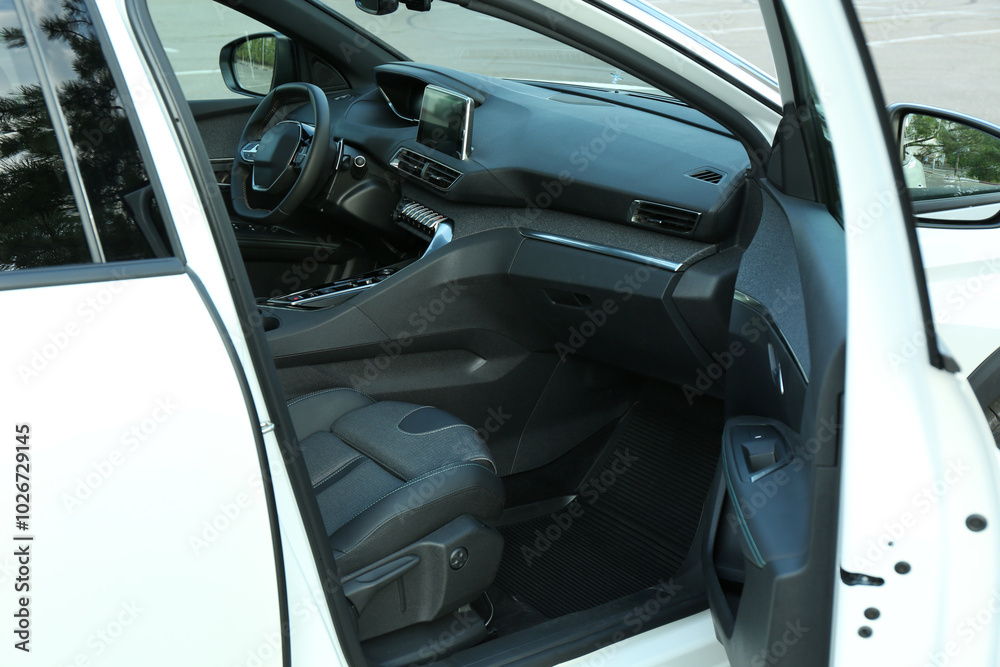 Steering wheel and dashboard inside of modern luxury car Steering wheel and dashboard inside of modern luxury car