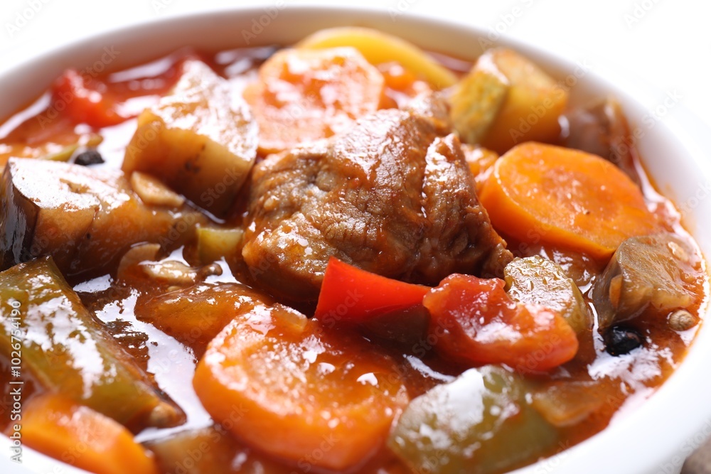 Delicious stew with vegetables in bowl, closeup Delicious stew with vegetables in bowl, closeup