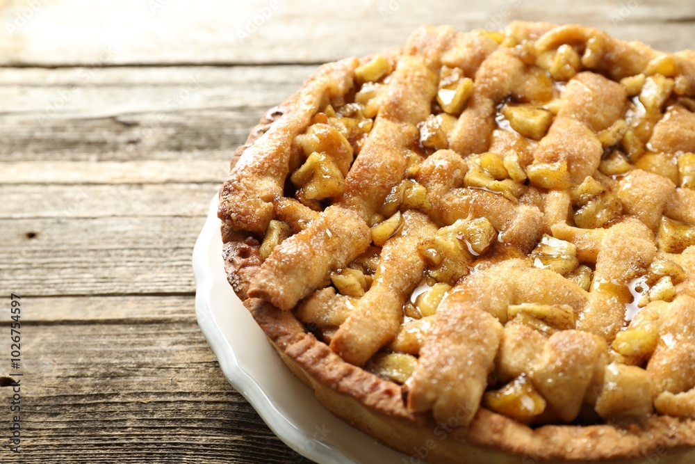 Homemade apple pie on wooden table, closeup Homemade apple pie on wooden table, closeup