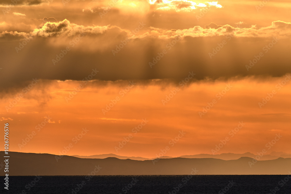 stunning sunset over Suasi Island. The sky transforms into a canvas of colors, reflecting the beauty and serenity of this magical place. Titicaca Lake Peru stunning sunset over Suasi Island. The sky transforms into a canvas of colors, reflecting the beauty and serenity of this magical place. Titicaca Lake Peru