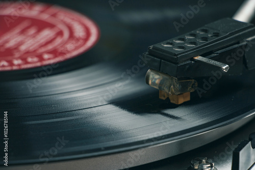 Close-up of a record player needle on a vinyl record