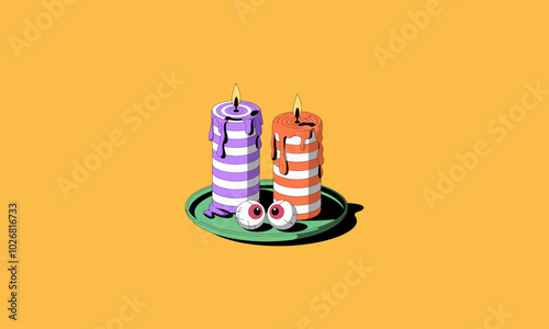 Two striped candles with eyeballs on a plate, Halloween-themed.