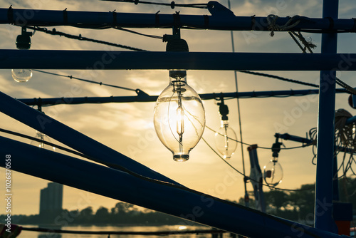 Evening Catch: Light Bulb’s Radiance on a Fishing Vessel photo