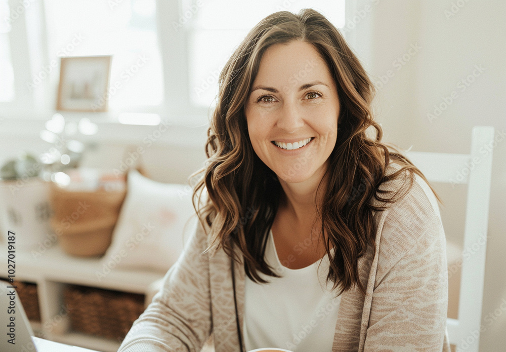 A cheerful woman sits in a cozy home environment, smiling as she works on her laptop, capturing a relaxed and productive mood in a remote work setting.
A cheerful woman sits in a cozy home environment, smiling as she works on her laptop, capturing a relaxed and productive mood in a remote work setting.