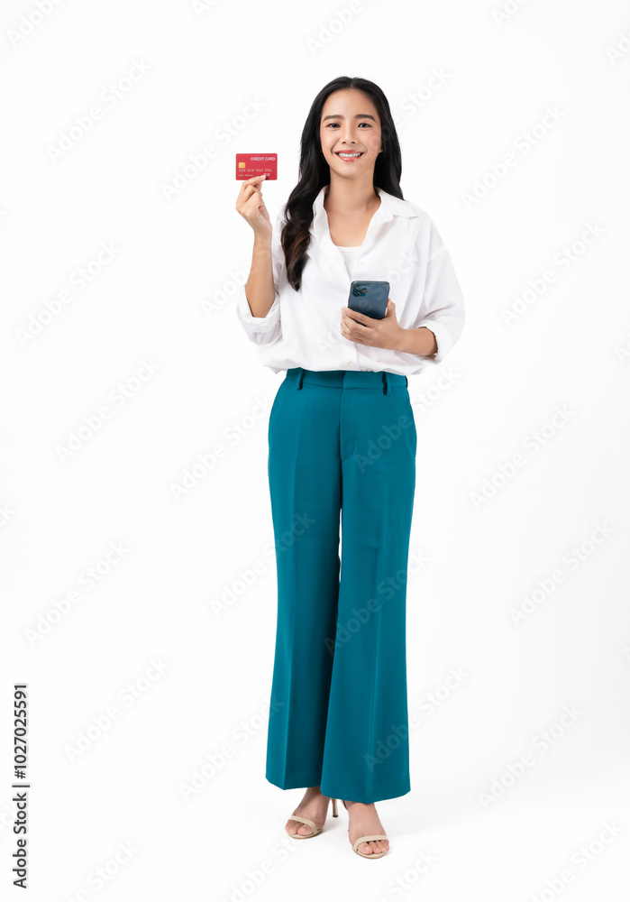 Beautiful Asian woman holding credit card and using smartphone on white background. Beautiful Asian woman holding credit card and using smartphone on white background.