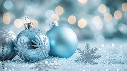 Blue Christmas Ornaments on a Light Blurred Background.