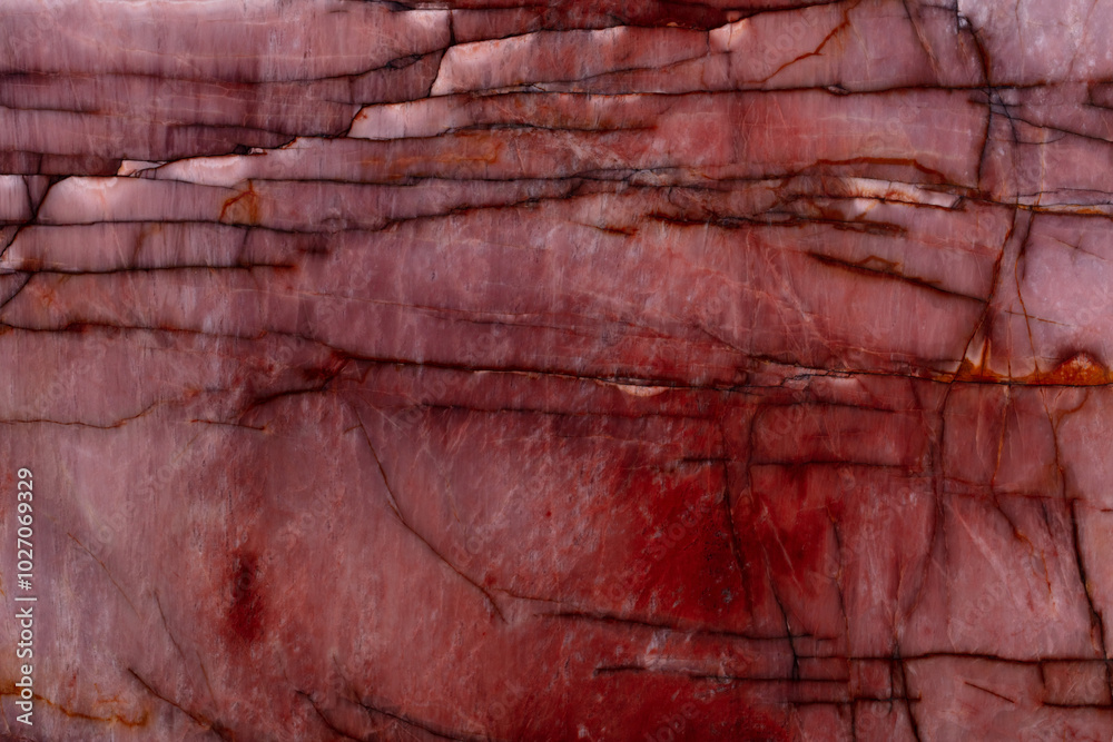 Natural quartzite background in strict red tone. Natural quartzite background in strict red tone.