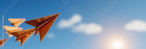 A flock of paper airplanes soaring through a pristine blue sky, symbolizing creativity, dreams, and aspirations, capturing the essence of freewheeling ambition.