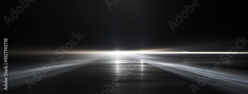 High-Speed Light Trails on a Dark Road at Night