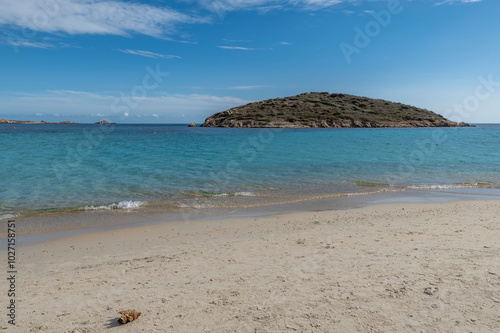 The sandy beach Tuerredda with the island Tuaredda in the background, Sardinia, Italy photo