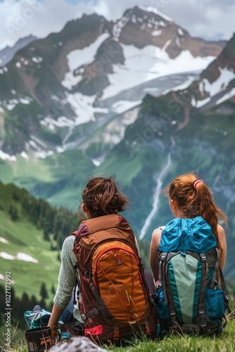 A happy girls tourists sit near the backpack and look