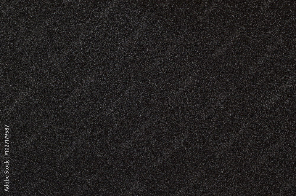Closeup of black textured plastic surface Closeup of black textured plastic surface