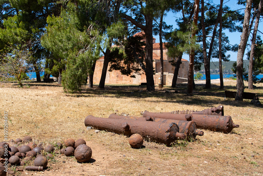 Old cannons and cannonballs inside Castle of Pylos (Niokastron)