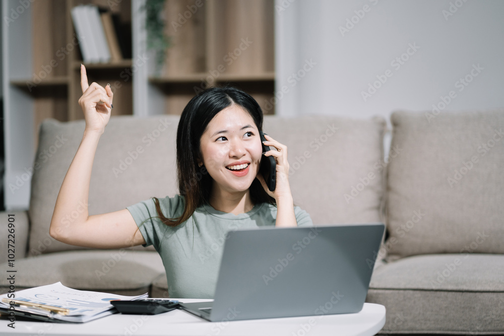 lifestyle Happy woman speaking to mobile phone at home. women speak with remote friend using phone. sitting on sofa. lifestyle Happy woman speaking to mobile phone at home. women speak with remote friend using phone. sitting on sofa.