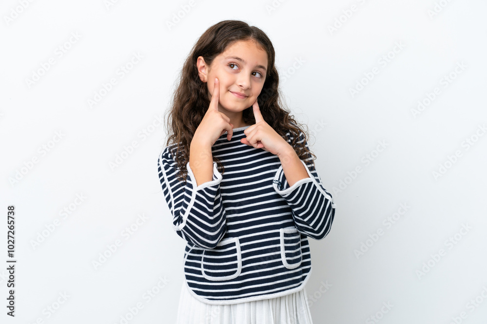 Little caucasian girl isolated on white background smiling with a happy and pleasant expression Little caucasian girl isolated on white background smiling with a happy and pleasant expression