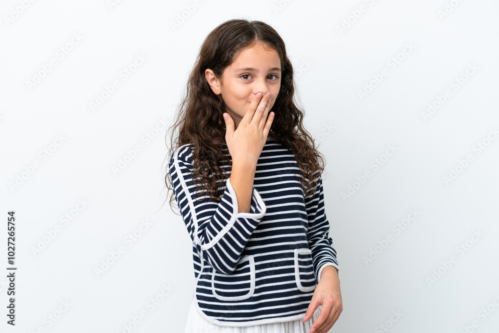 Little caucasian girl isolated on white background happy and smiling covering mouth with hand Little caucasian girl isolated on white background happy and smiling covering mouth with hand