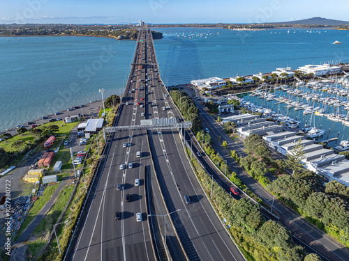 Aerial: Westhaven marina and auckland harbour bridge, Auckland city, New Zealand photo
