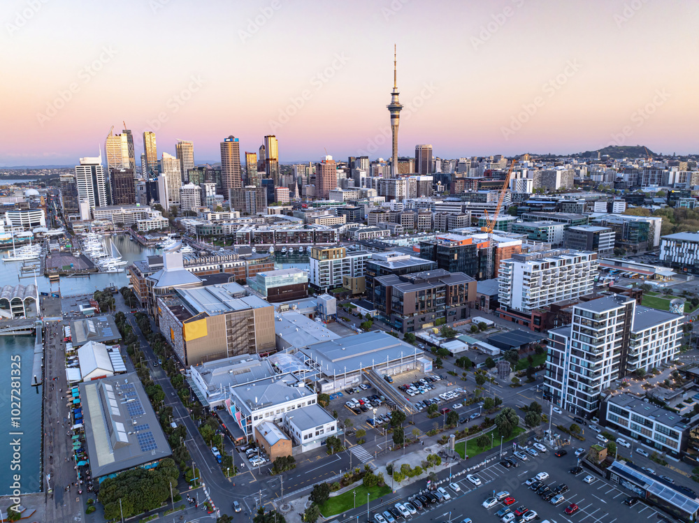 Naklejka premium Aerial: Wynyard quarter looking back towards Auckland city, New Zealand