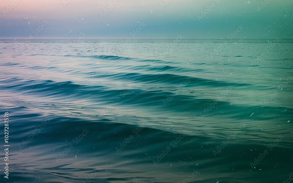 Fototapeta premium Calm ocean waves. Serene ocean surface with gentle waves, symbolizing peace and tranquility.