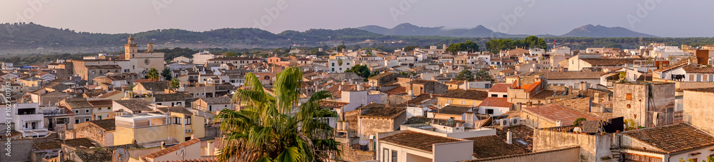 Aerial panoramic view of the Mallorcan town of Arta, on the island of Mallorca at sunrise. Spain Aerial panoramic view of the Mallorcan town of Arta, on the island of Mallorca at sunrise. Spain