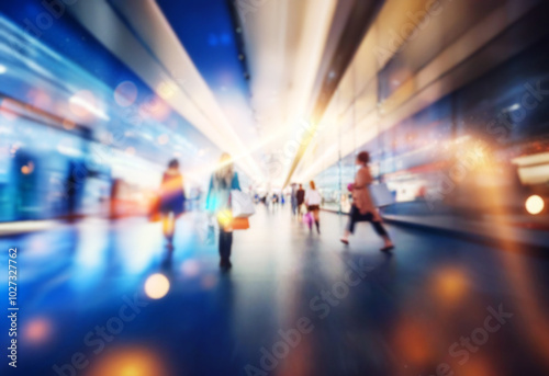 Wallpaper Mural Blurred view of a shopping mall with people walking and holding shopping bags. Torontodigital.ca