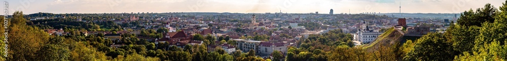 Fototapeta premium Panorama view on a sunny day over Vilnius with old churches, river and TV Tower, Lithuania