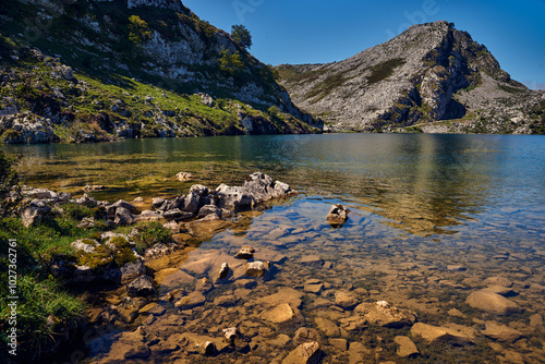 the red stony shore of the lake