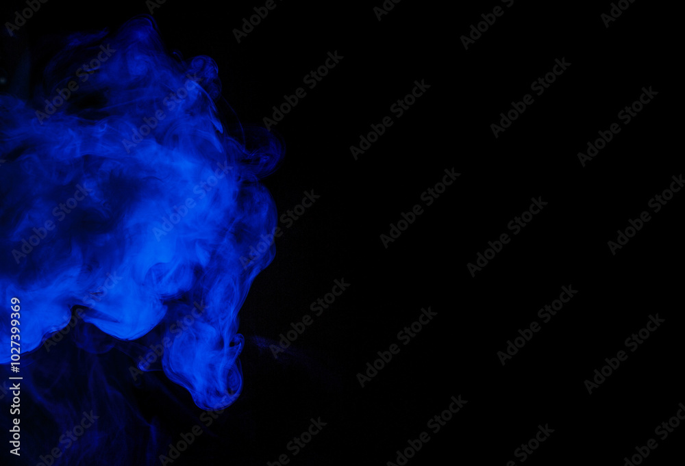 Blue smoke on black background Blue smoke on black background